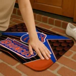 boise-state-broncos-techno-camo-orange-black-doormat-best-selling.webp