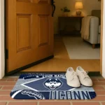 custom-uconn-huskies-football-crest-blue-black-doormat-best-selling.webp