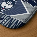 custom-uconn-huskies-football-crest-blue-black-doormat-best-selling.webp