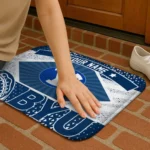 customized-byu-cougars-football-crest-blue-black-doormat-best-selling.webp