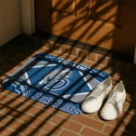 customized-drake-bulldogs-football-crest-blue-black-doormat-best-selling.webp