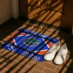 customized-florida-gators-football-crest-blue-black-doormat-best-selling.webp