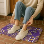 east-carolina-pirates-helmet-illustration-purple-doormat-best-selling.webp