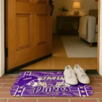 james-madison-dukes-helmet-illustration-purple-doormat-best-selling.webp