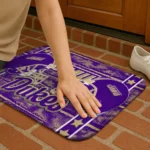 james-madison-dukes-helmet-illustration-purple-doormat-best-selling.webp