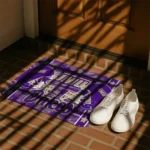 james-madison-dukes-helmet-illustration-purple-doormat-best-selling.webp