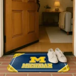 michigan-wolverines-silver-halftone-blue-doormat-best-selling.webp