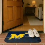 michigan-wolverines-tribal-detailing-blue-black-doormat-best-selling.webp