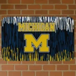 michigan-wolverines-vertical-flow-blue-doormat-best-selling.webp