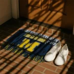michigan-wolverines-vertical-flow-blue-doormat-best-selling.webp