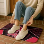 nebraska-cornhuskers-techno-camo-red-black-doormat-best-selling.webp