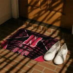 nebraska-cornhuskers-techno-camo-red-black-doormat-best-selling.webp