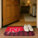 nebraska-cornhuskers-tribal-detailing-red-black-doormat-best-selling.webp