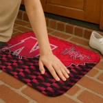 nebraska-cornhuskers-tribal-detailing-red-black-doormat-best-selling.webp
