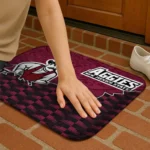new-mexico-state-aggies-tribal-detailing-crimson-black-doormat-best-selling.webp