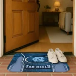 north-carolina-tar-heels-hexagon-oval-light-blue-doormat-best-selling.webp