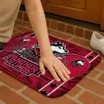 northern-illinois-huskies-helmet-illustration-red-doormat-best-selling.webp