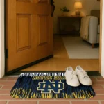 notre-dame-fighting-irish-vertical-flow-navy-doormat-best-selling.webp