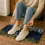 notre-dame-fighting-irish-vertical-flow-navy-doormat-best-selling.webp