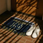 notre-dame-fighting-irish-vertical-flow-navy-doormat-best-selling.webp