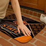 oklahoma-state-cowboys-techno-camo-orange-black-doormat-best-selling.webp