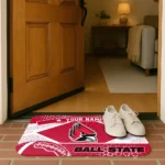 personalized-ball-state-cardinals-football-crest-red-black-doormat-best-selling.webp