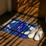 personalized-duke-blue-devils-football-crest-blue-black-doormat-best-selling.webp
