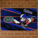 personalized-florida-gators-mickey-quarterback-blue-black-doormat-best-selling.webp