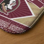 personalized-florida-state-seminoles-football-crest-garnet-black-doormat-best-selling.webp