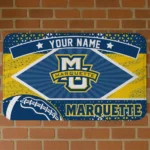 personalized-marquette-golden-eagles-football-crest-blue-black-doormat-best-selling.webp