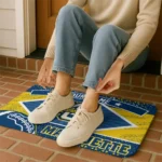 personalized-marquette-golden-eagles-football-crest-blue-black-doormat-best-selling.webp