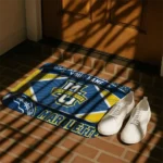 personalized-marquette-golden-eagles-football-crest-blue-black-doormat-best-selling.webp