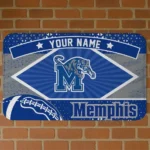personalized-memphis-tigers-football-crest-blue-black-doormat-best-selling.webp