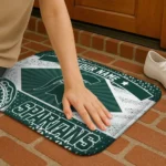 personalized-michigan-state-spartans-football-crest-green-black-doormat-best-selling.webp