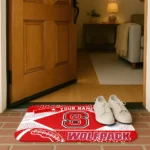 personalized-nc-state-wolfpack-football-crest-red-black-doormat-best-selling.webp