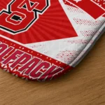 personalized-nc-state-wolfpack-football-crest-red-black-doormat-best-selling.webp