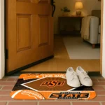 personalized-oklahoma-state-cowboys-football-crest-orange-black-doormat-best-selling.webp