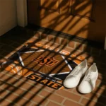 personalized-oklahoma-state-cowboys-football-crest-orange-black-doormat-best-selling.webp