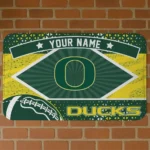 Personalized Oregon Ducks Football Crest Green Black Doormat
