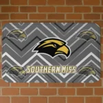southern-miss-golden-eagles-chevron-geometrics-black-doormat-best-selling.webp