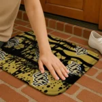 ucf-knights-palm-silhouette-gold-black-doormat-best-selling.webp