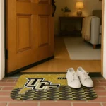 ucf-knights-tribal-detailing-gold-black-doormat-best-selling.webp