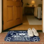 uconn-huskies-helmet-illustration-blue-doormat-best-selling.webp