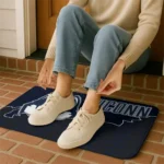 uconn-huskies-tribal-detailing-blue-black-doormat-best-selling.webp