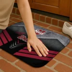 umass-minutemen-chevron-points-red-black-doormat-best-selling.webp