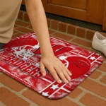 wisconsin-badgers-helmet-illustration-red-doormat-best-selling.webp