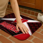 wisconsin-badgers-techno-camo-red-black-doormat-best-selling.webp