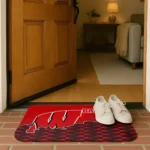 wisconsin-badgers-tribal-detailing-red-black-doormat-best-selling.webp