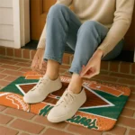 custom-miami-hurricanes-football-crest-orange-black-doormat-best-selling.webp