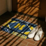 custom-michigan-wolverines-football-crest-blue-black-doormat-best-selling.webp